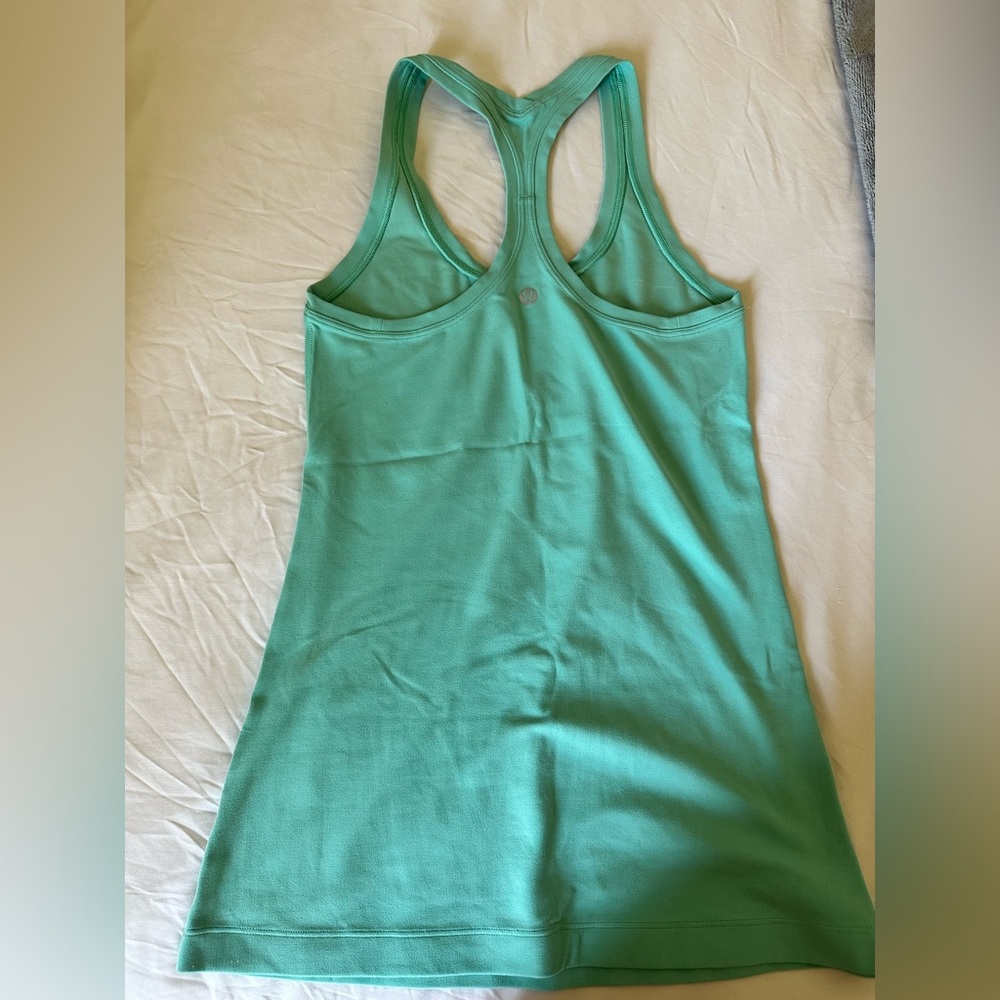 Lightly used turquoise Lululemon racer back tank size 4